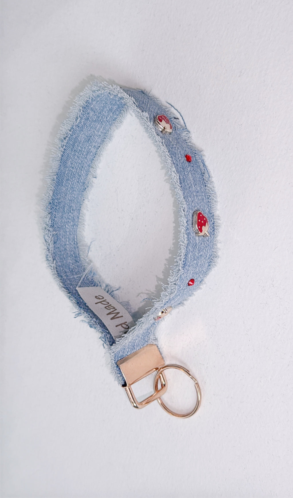 Wristlet keychain - light denim w/ strawberry charms and red rhinestone