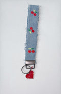 wristlet keychain - light denim w/ embroidered cherry