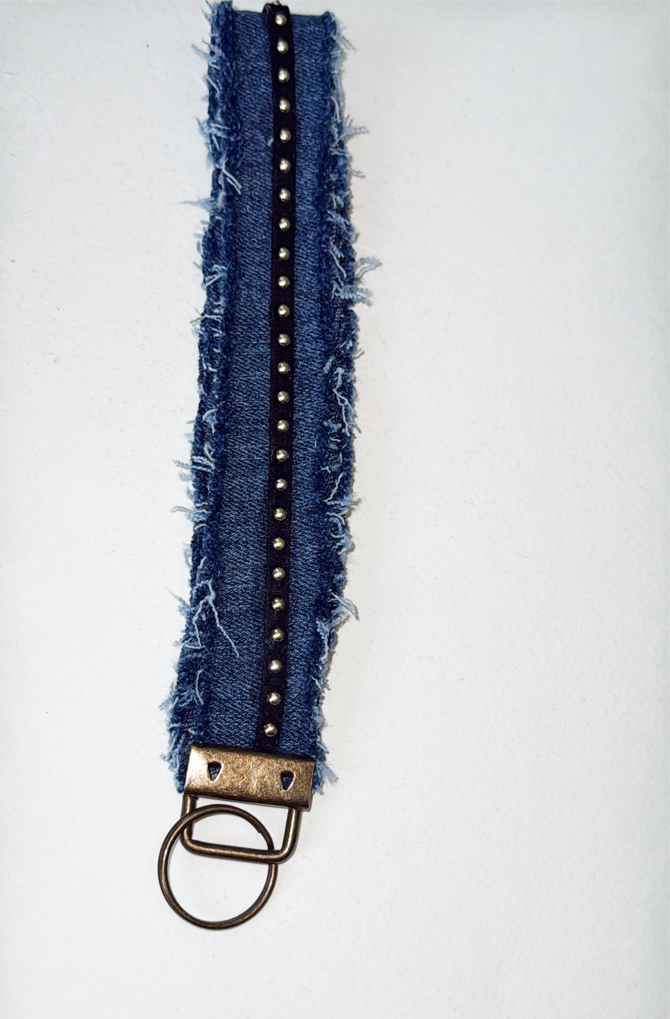 Wristlet keychain - blk faux leather, gold stud Med wash denim