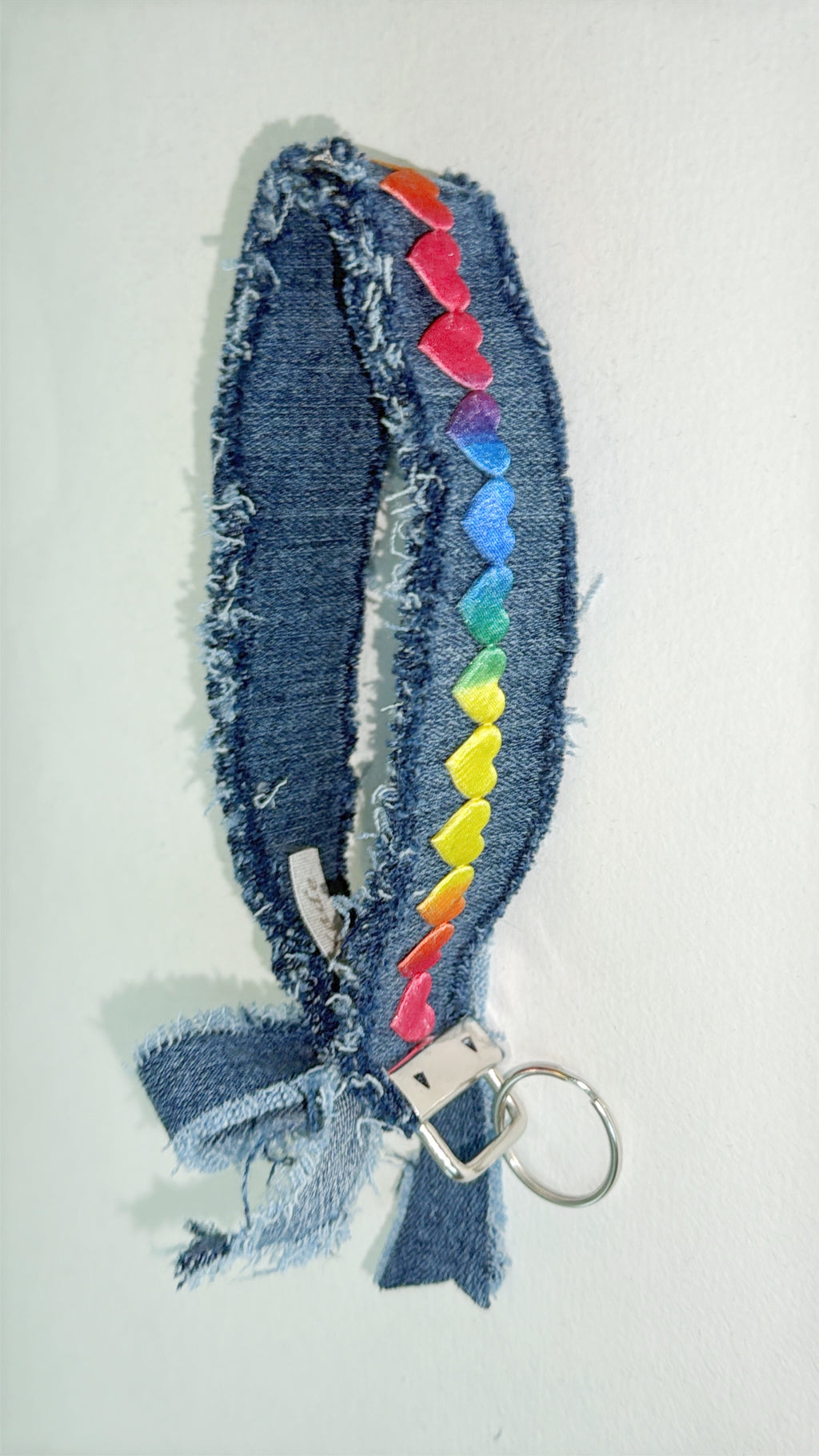 wristlet keychain - dark denim with rainbow heart ribbon and large bow
