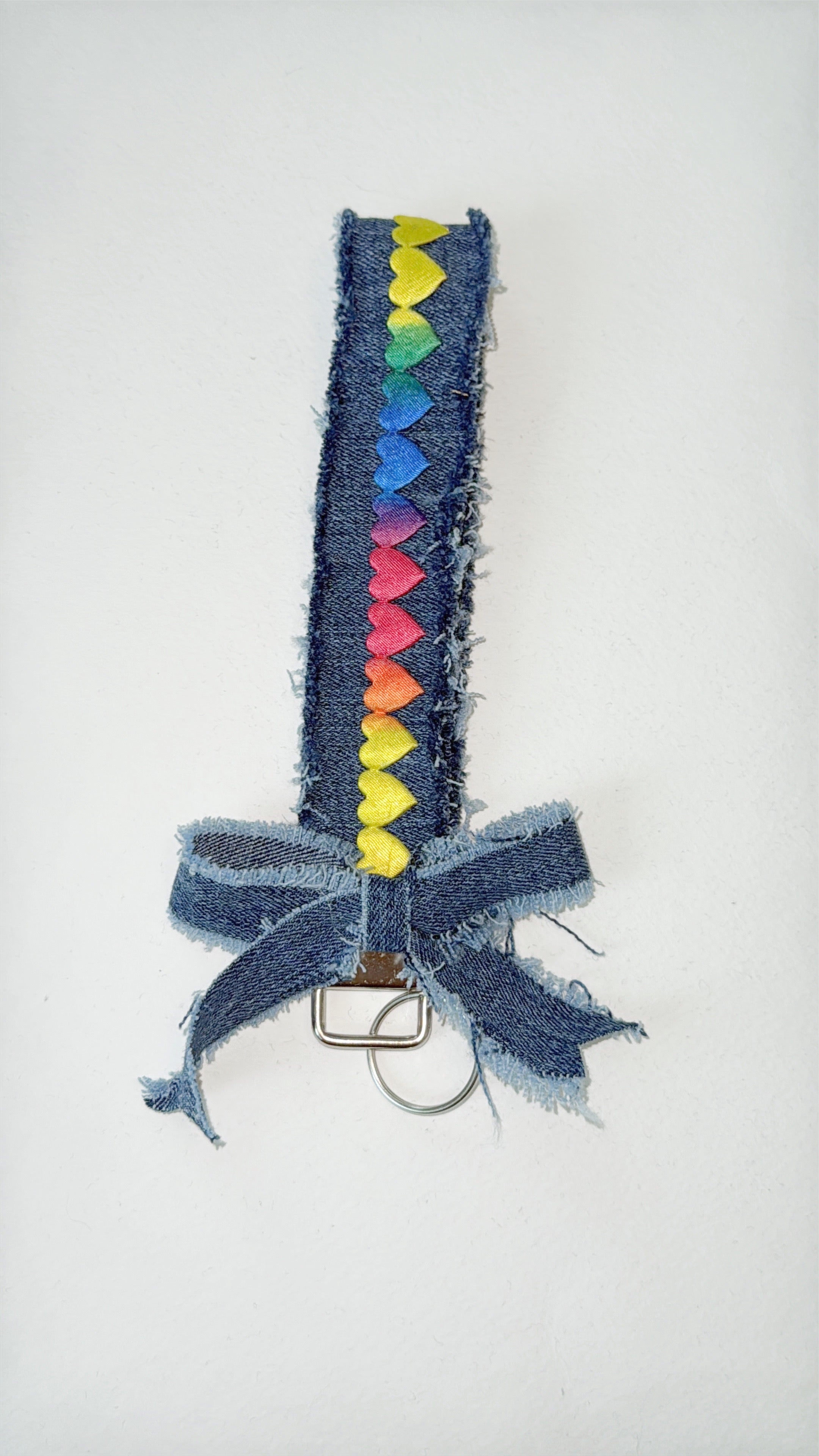 wristlet keychain - dark denim with rainbow heart ribbon and large bow