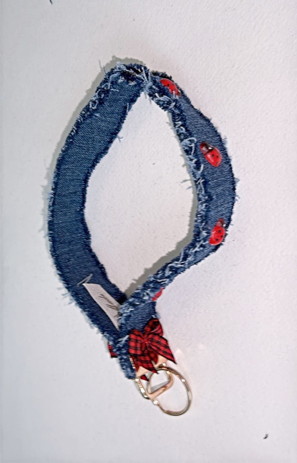 wristlet keychain - dark denim with wood 2D ladybug embellishment